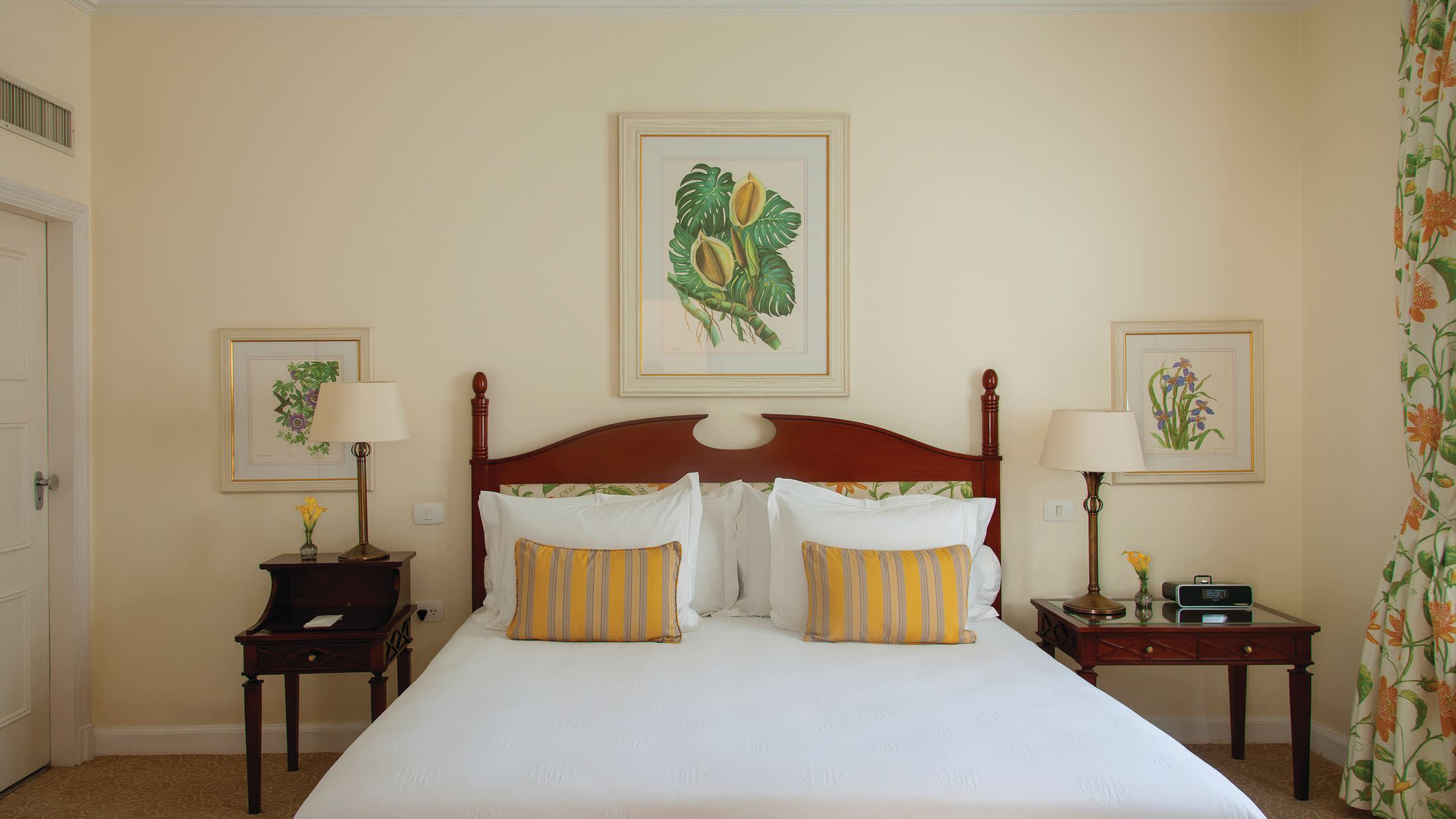 a bedroom with a bed in a room