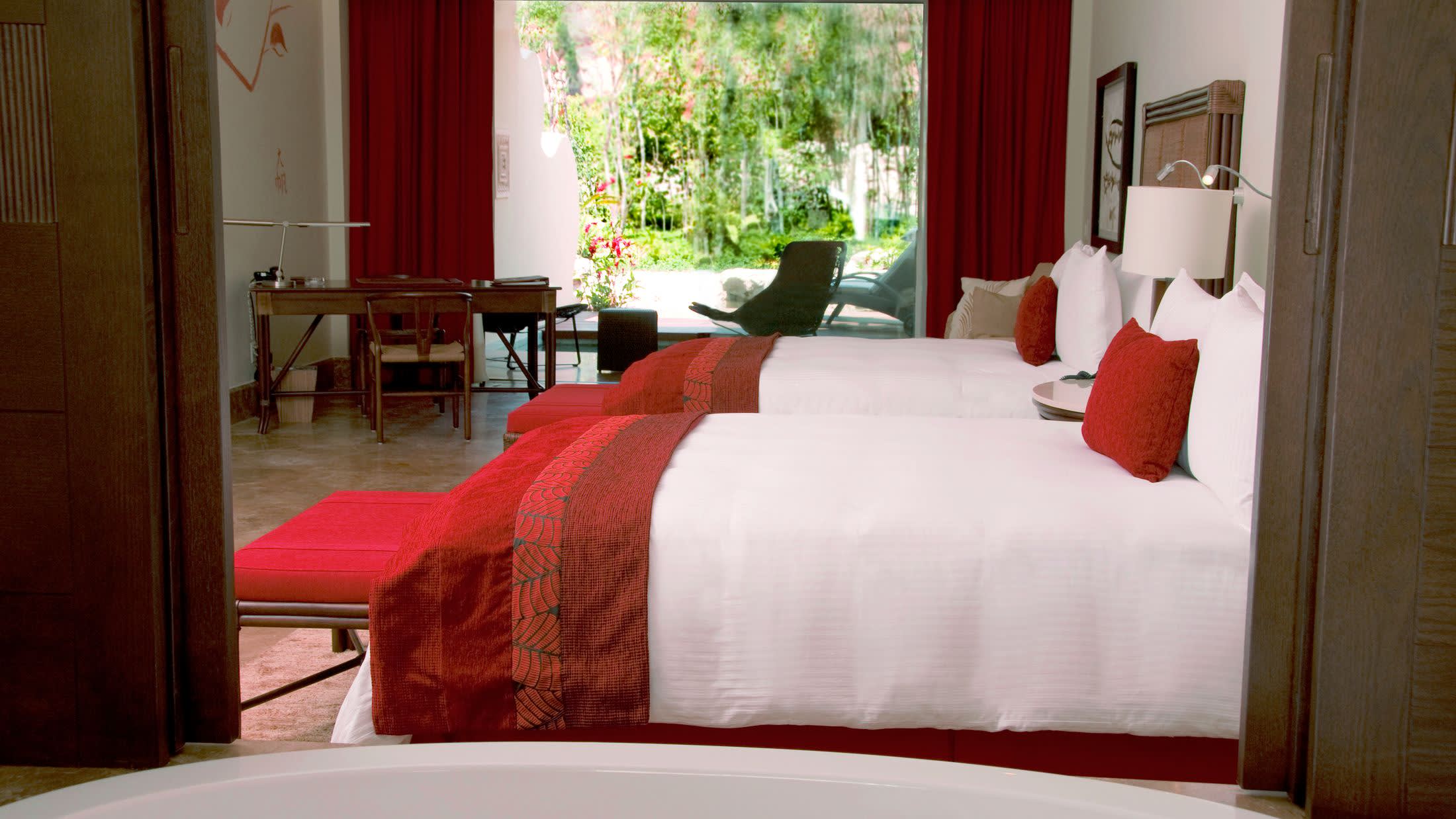 a bedroom with a bed in a hotel room