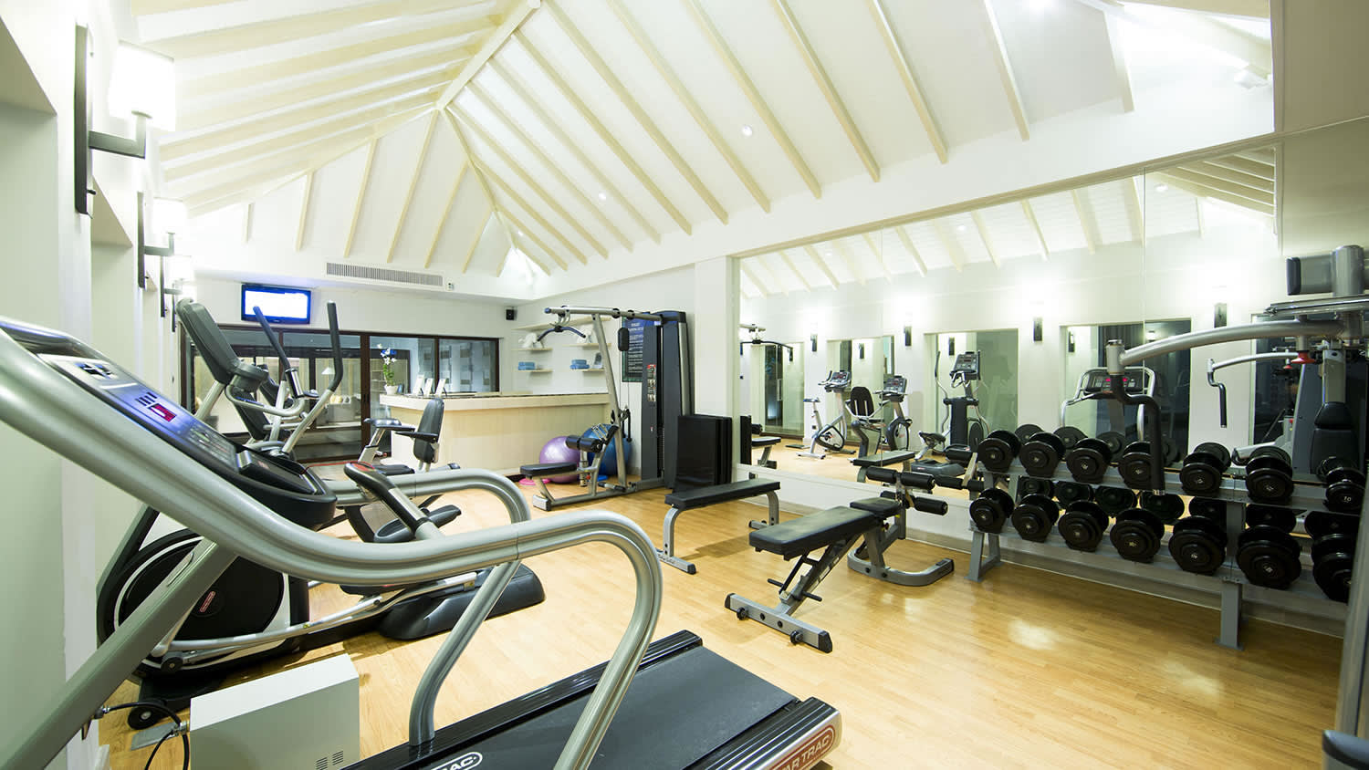 an office with a desk and chair in a room