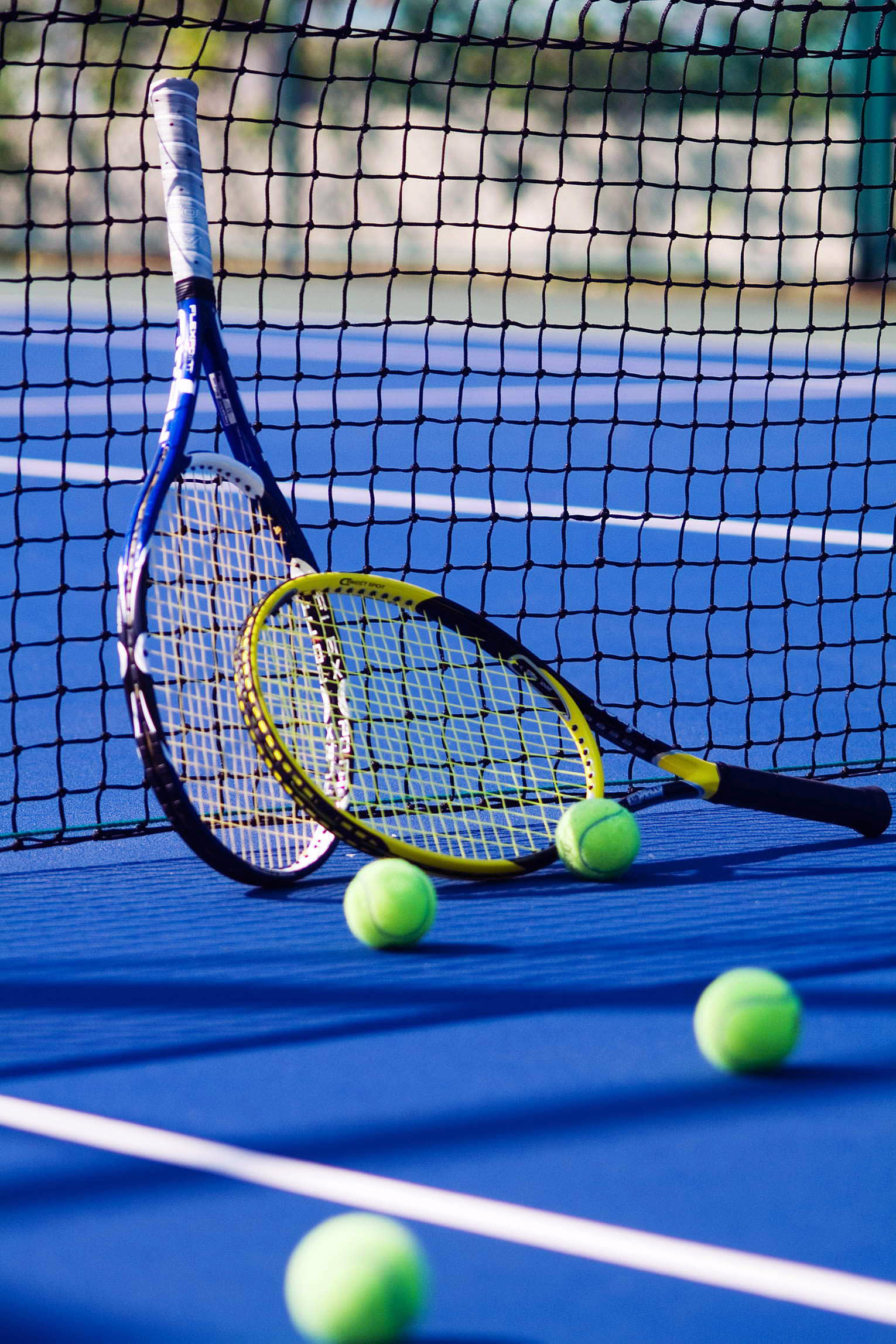a person hitting a ball with a racket