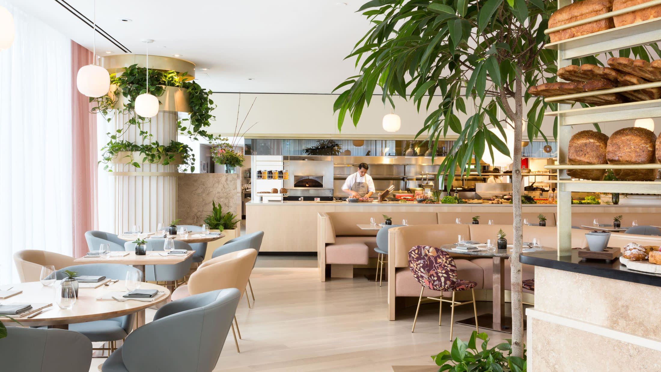 a dining room table in front of a window