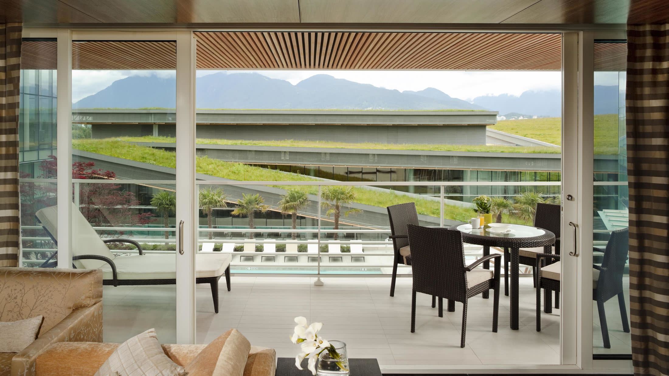 a dining room table in front of a window
