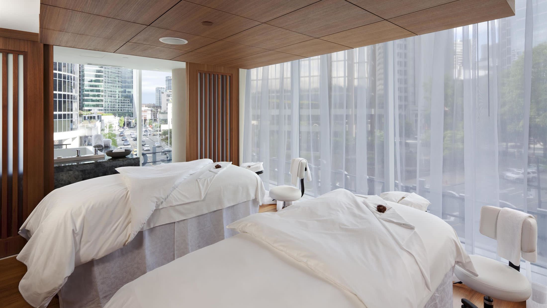a bedroom with a large bed in a hotel room