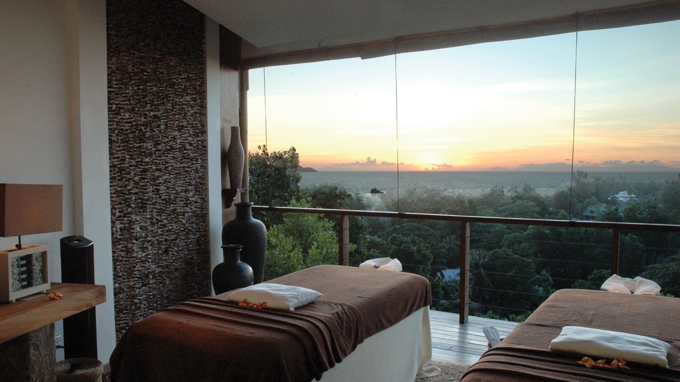 a bedroom with a large bed in a room