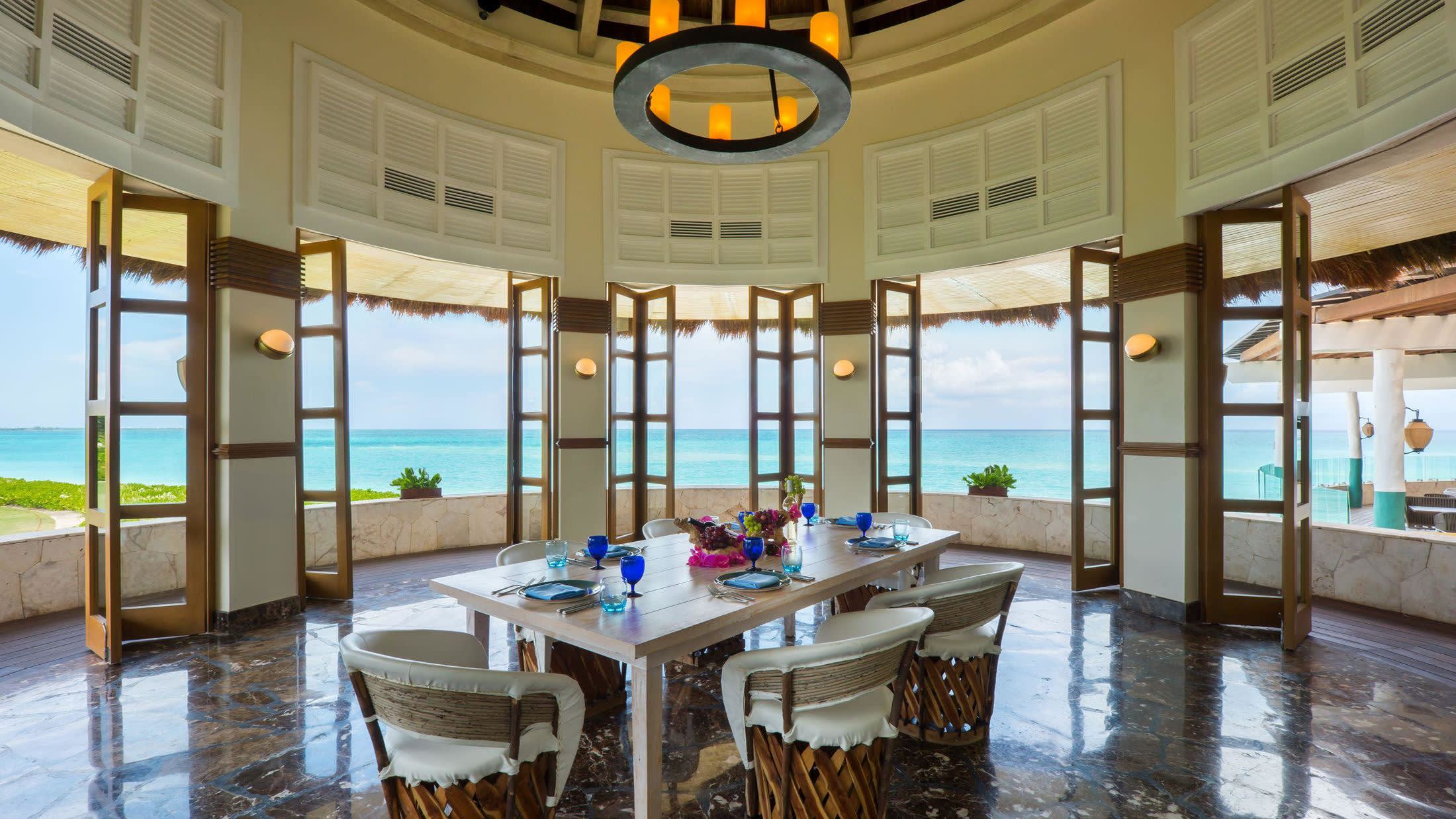 a room filled with furniture and a large window