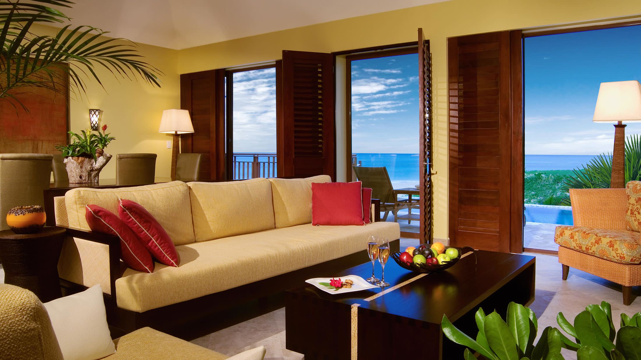 a living room filled with furniture and a flat screen tv