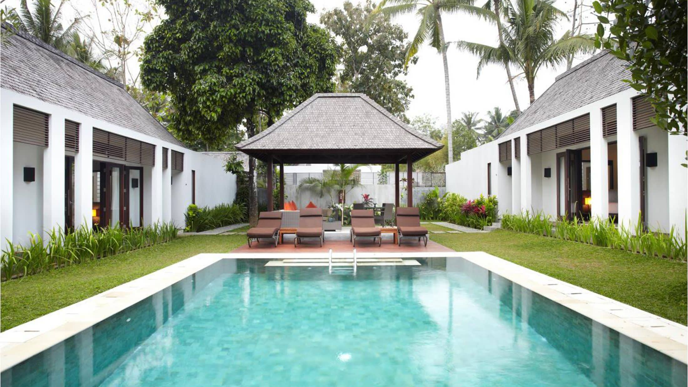 a small house in a pool of water