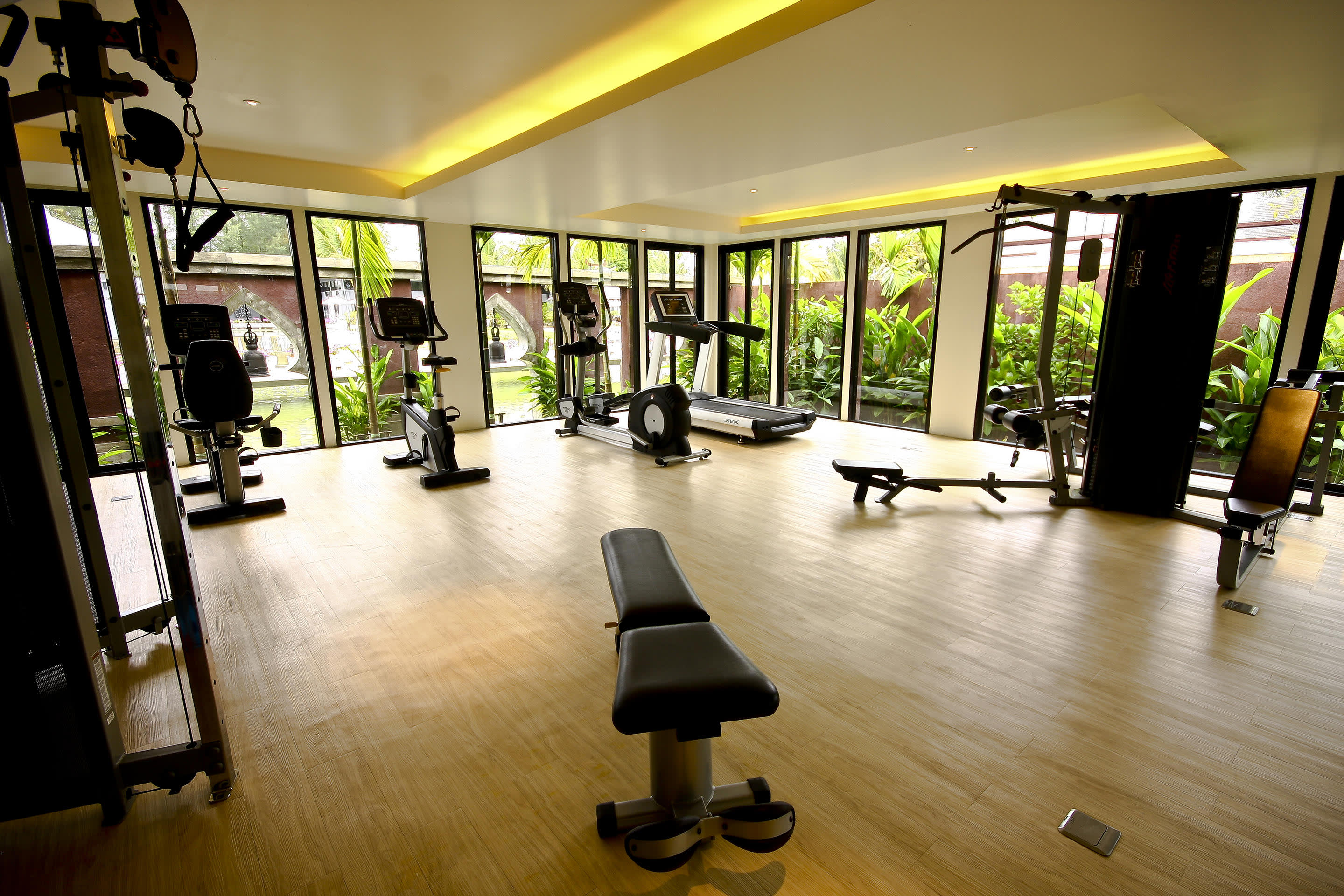 a room filled with furniture and a large window