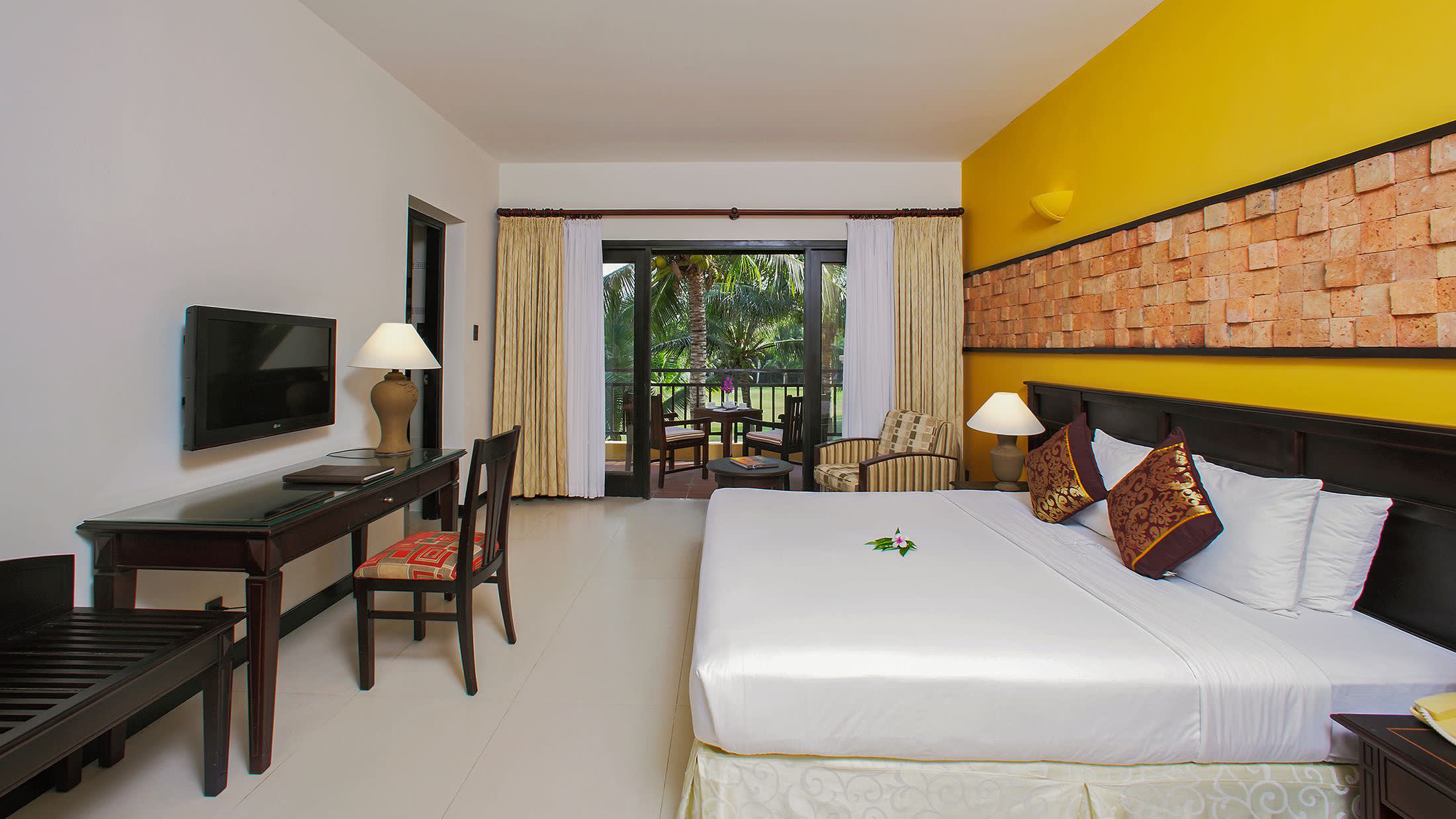 a living room filled with furniture and a fire place