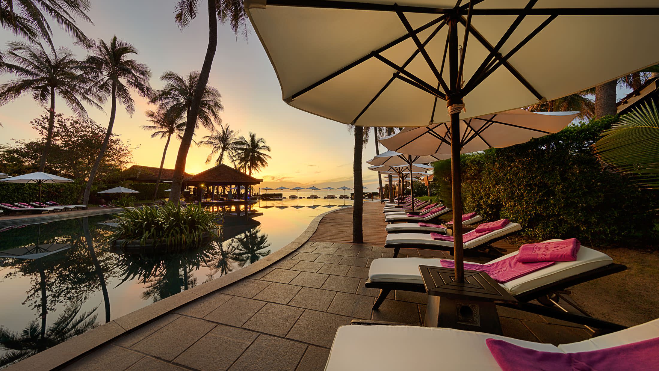 an umbrella with palm trees