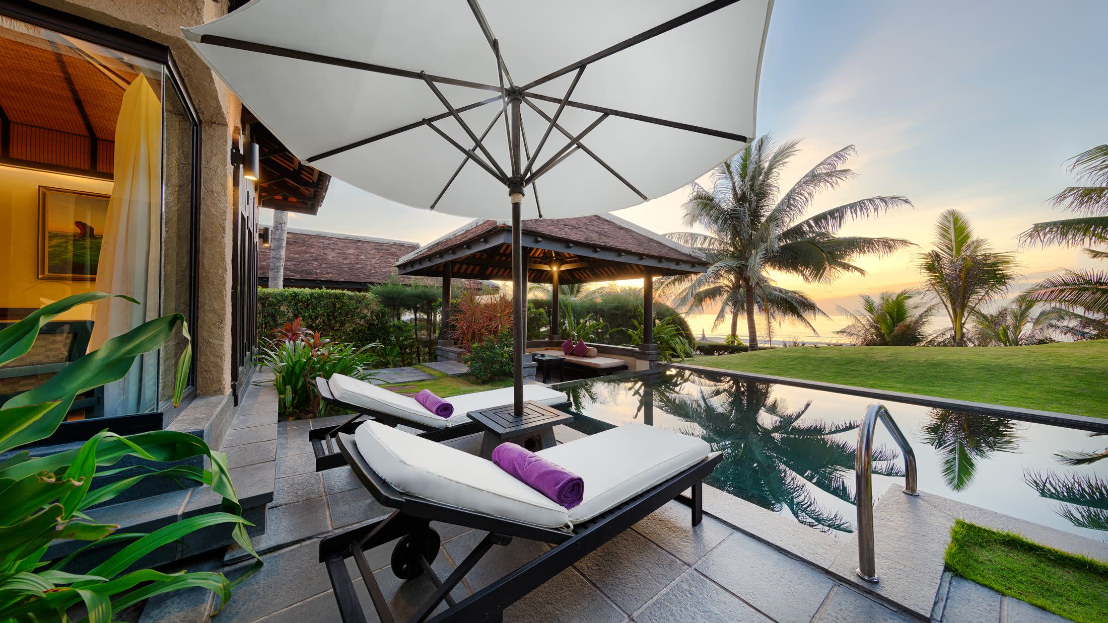 a couple of lawn chairs sitting on top of a table