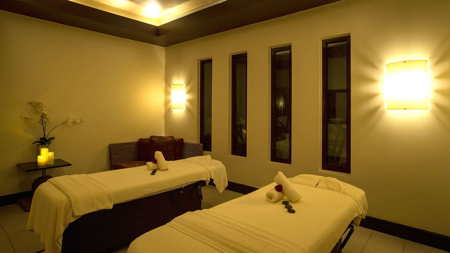 a bedroom with a large bed in a hotel room