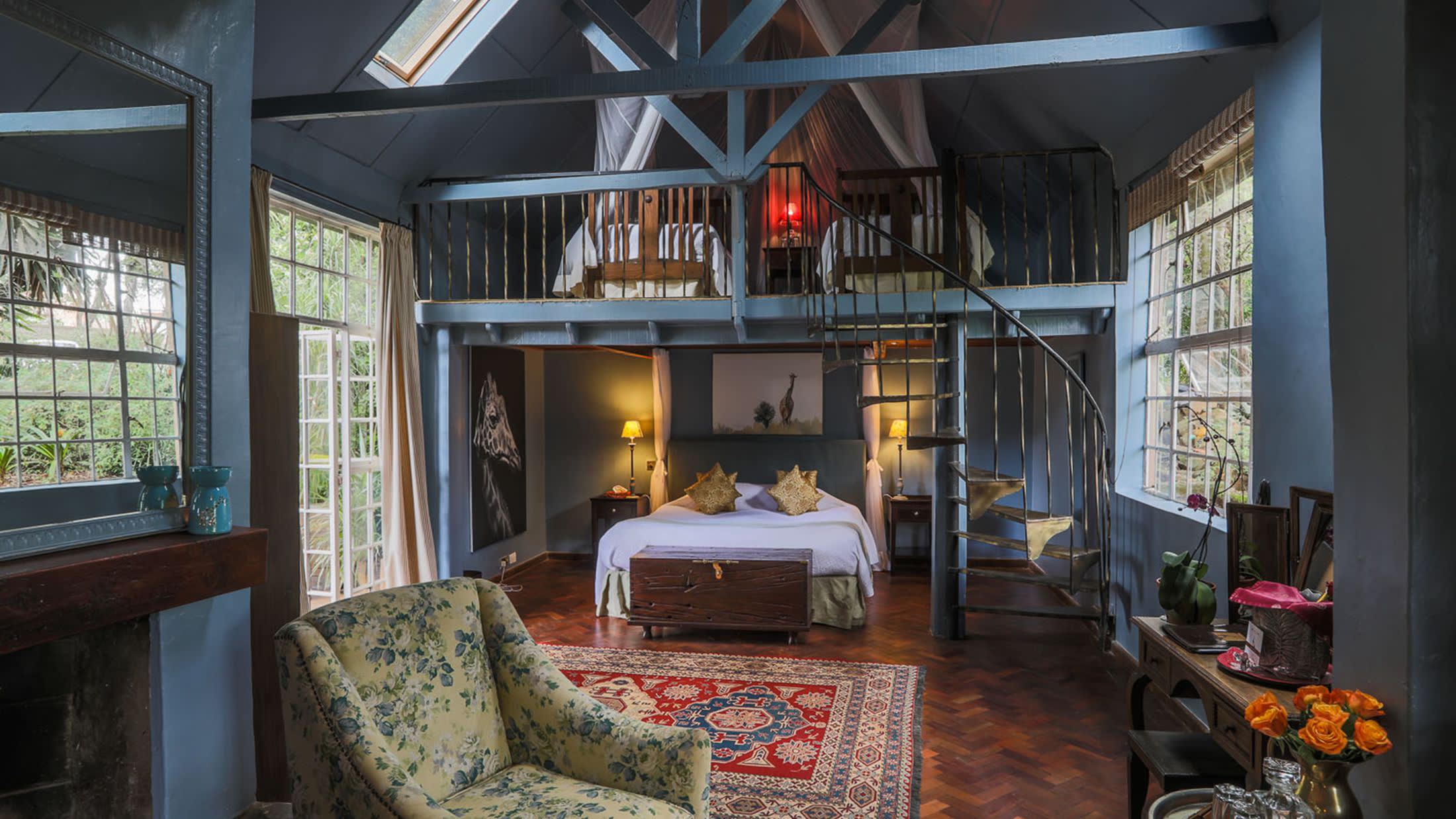 a living room filled with furniture and a fire place