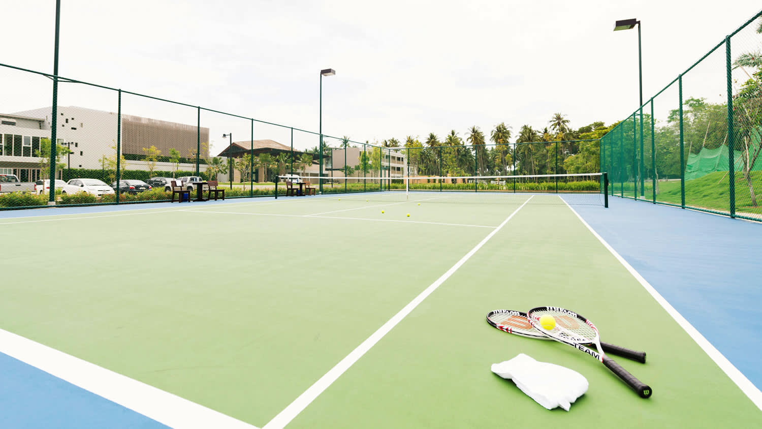 a person on a court with a racket