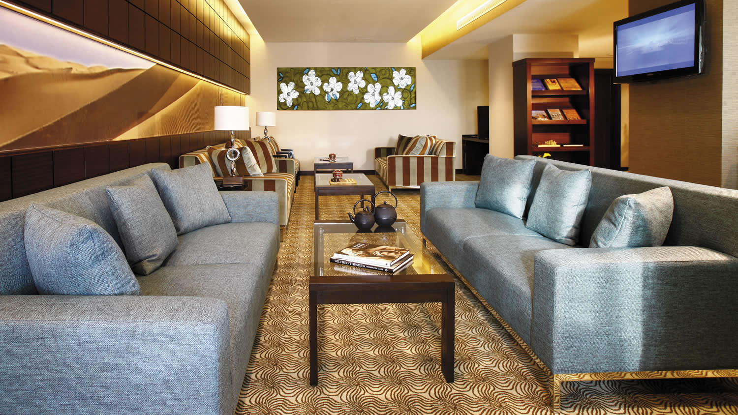 a living room with a leather chair