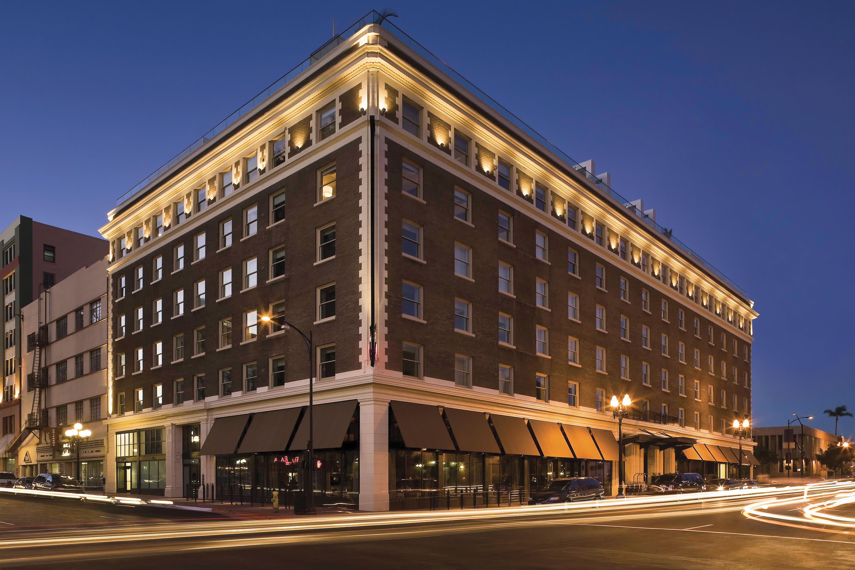 a large clock tower towering over a city