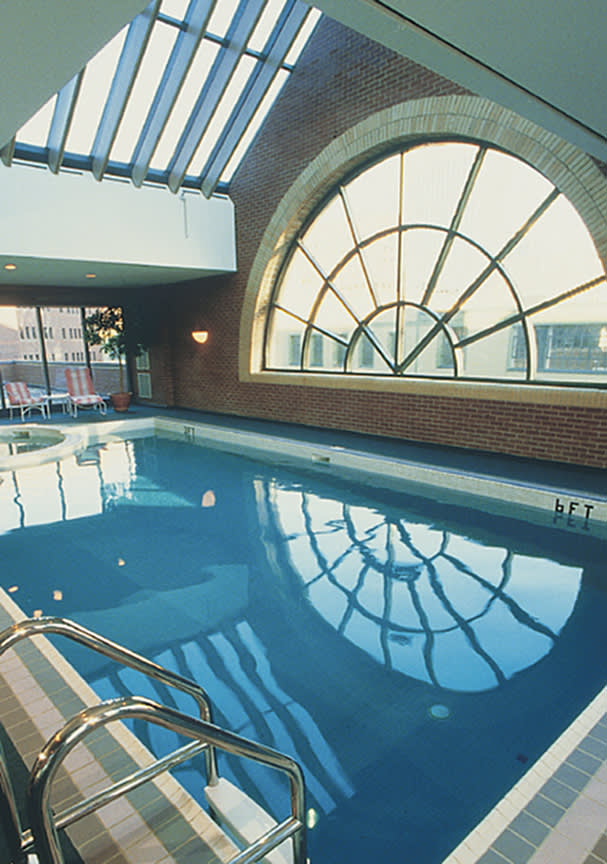 a glass with a blue chair