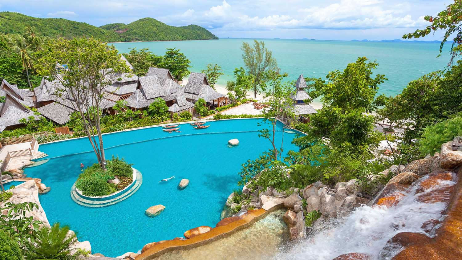 a pool next to a body of water