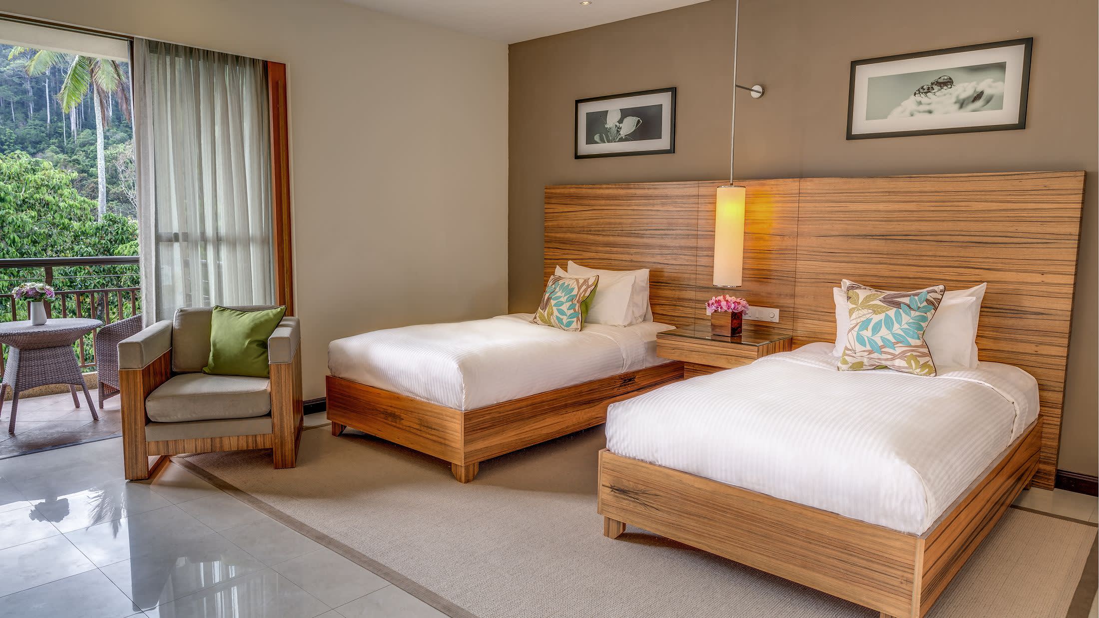 a bedroom with a bed and desk in a room