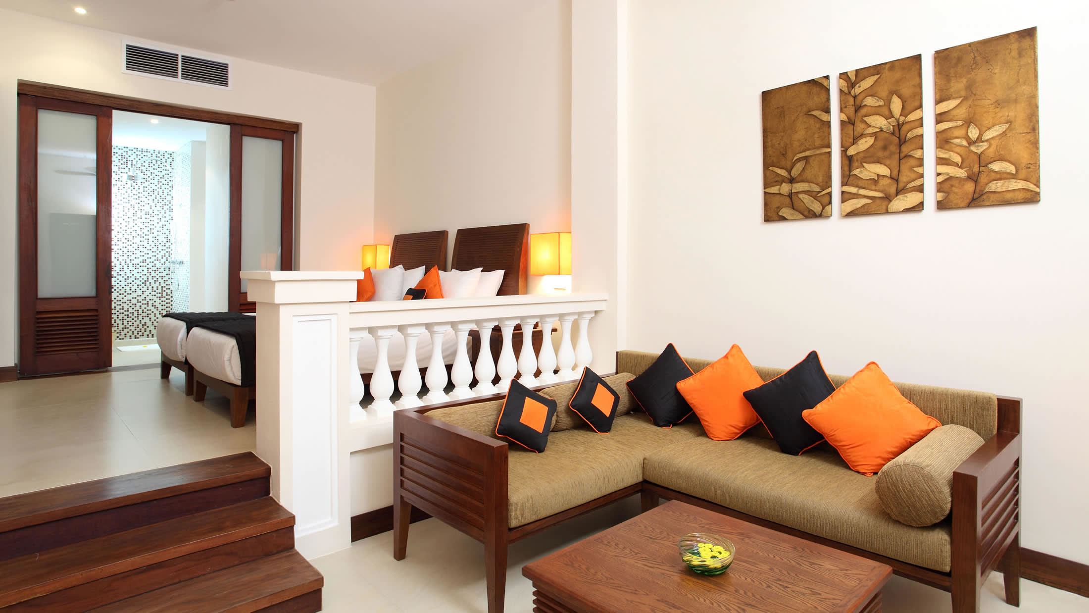 a living room filled with furniture and a fire place