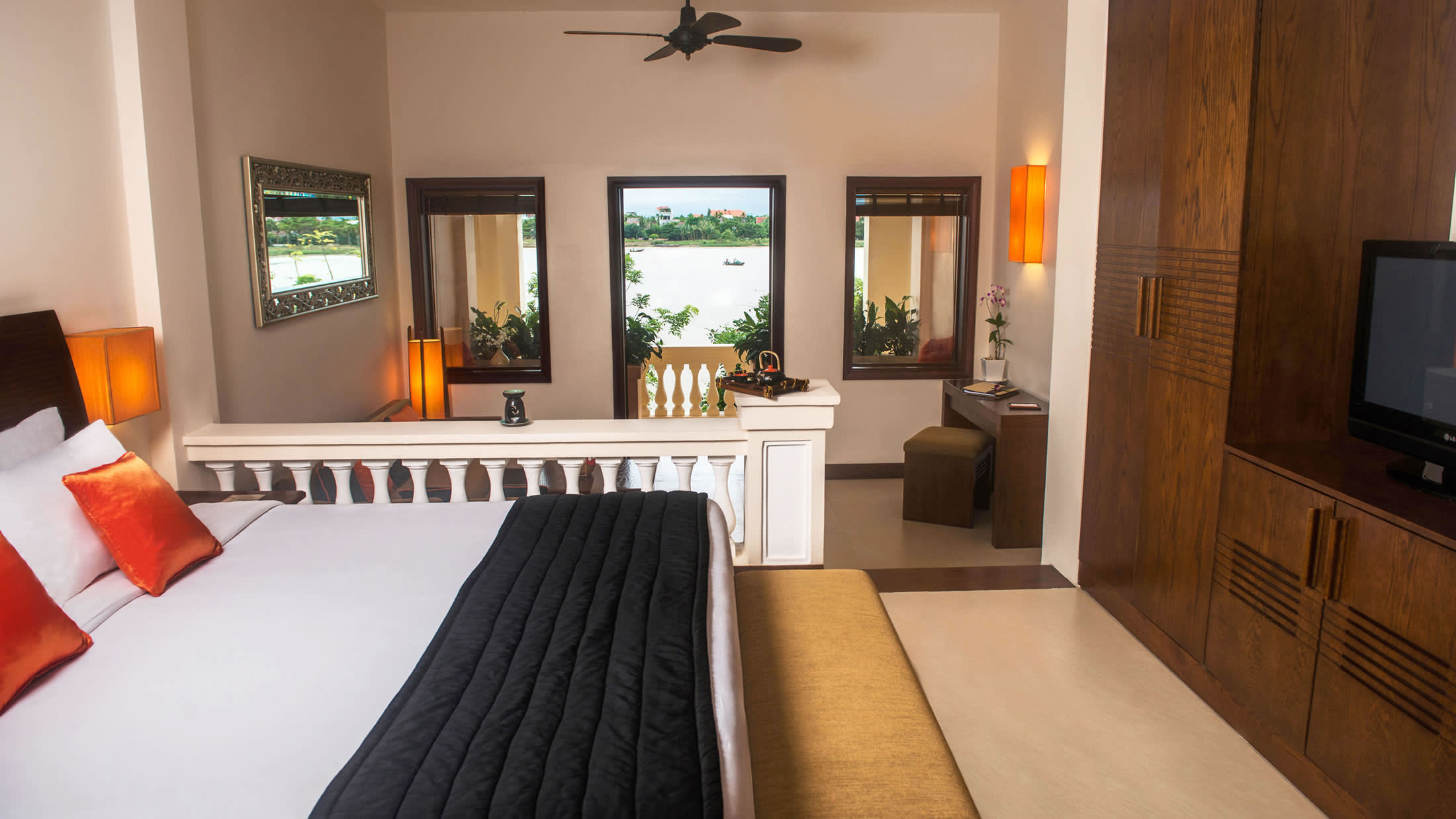 a bedroom with a bed in a room