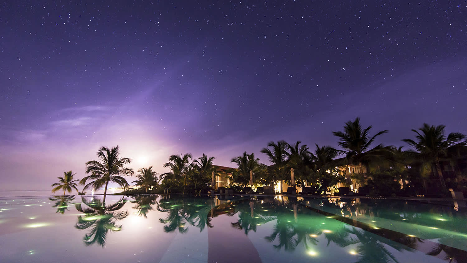 a sunset over a body of water