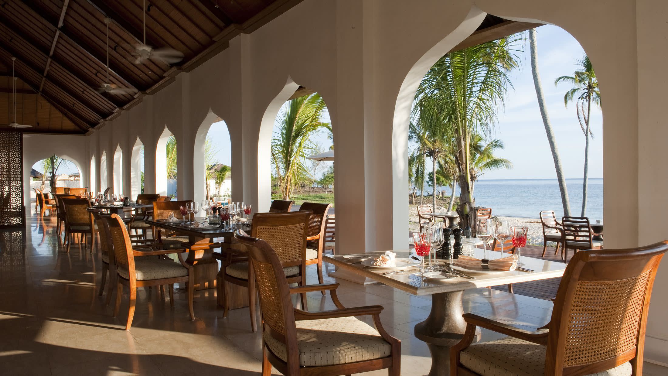 a dining room table in front of a window