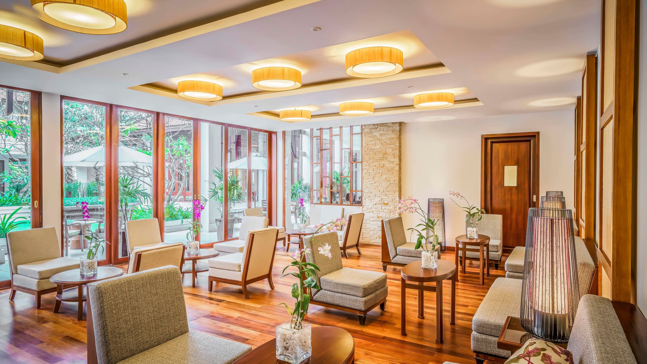 a view of a living room filled with furniture and a fireplace