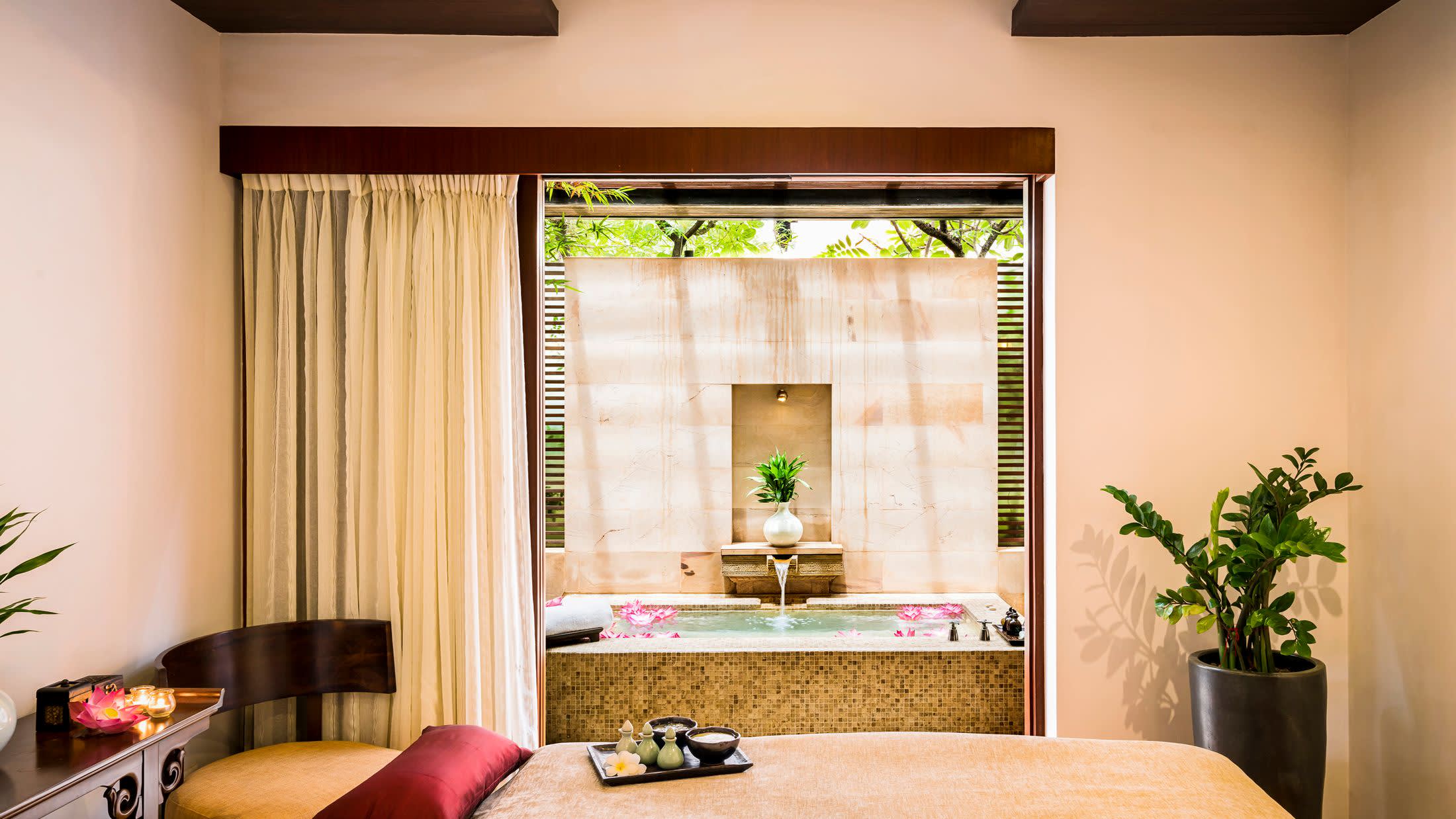 a living room filled with furniture and a flat screen tv