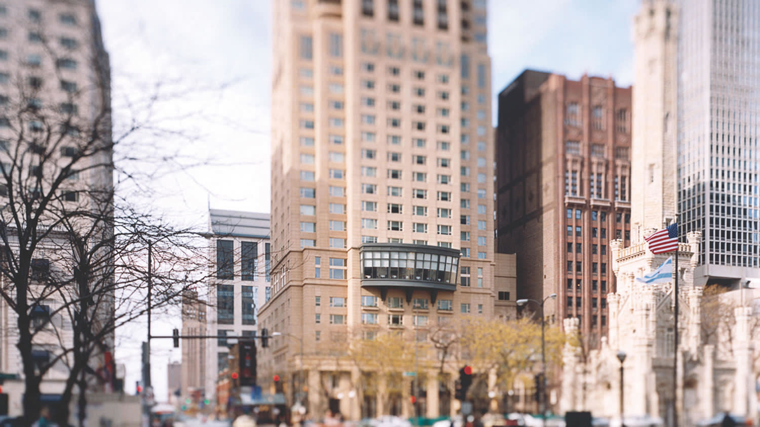 a group of people walking on a city street