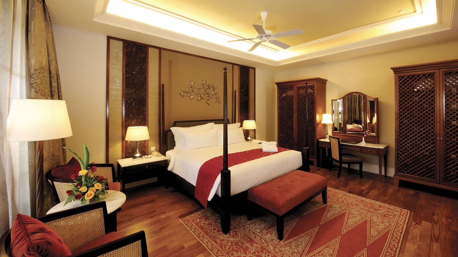 a bedroom with a view of a living room