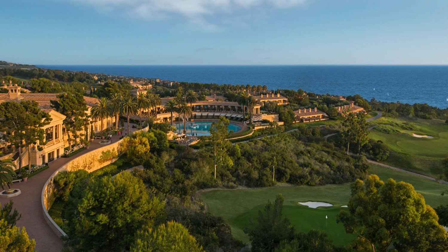 a view of a body of water with a city in the background
