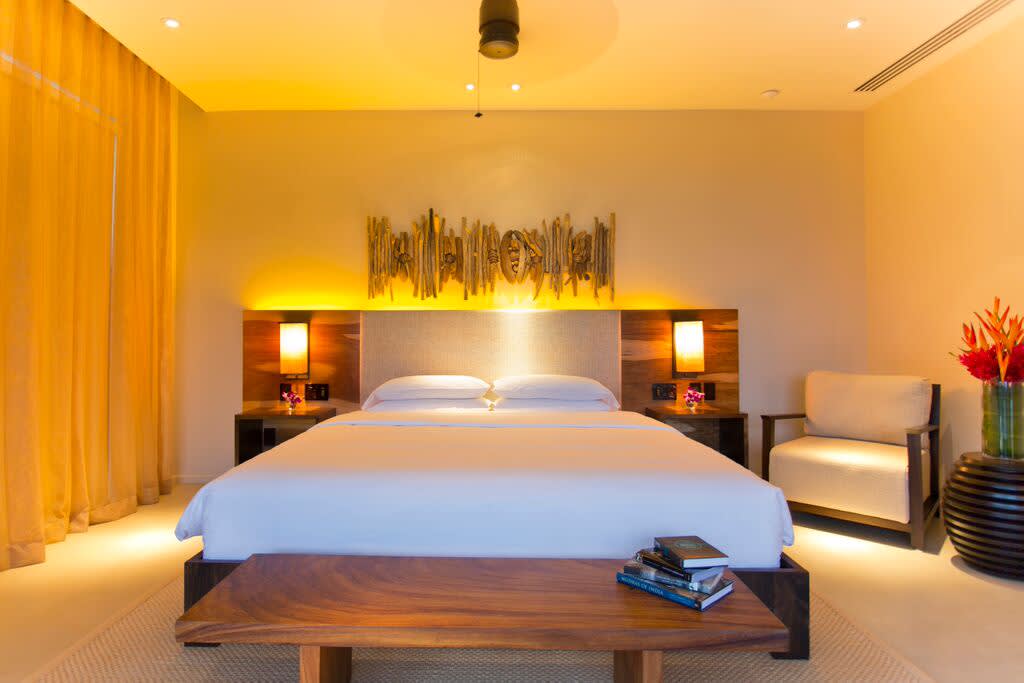 a bedroom with a bed in a hotel room