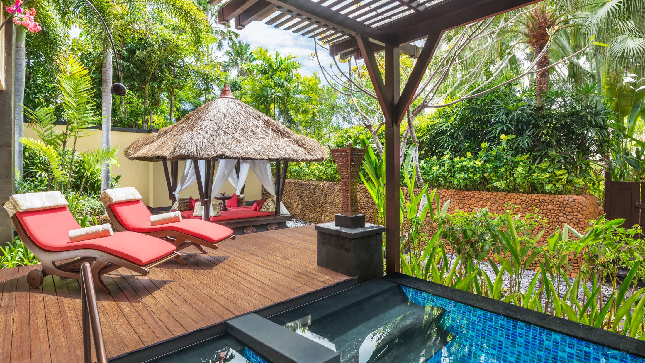 a chair sitting in front of a building