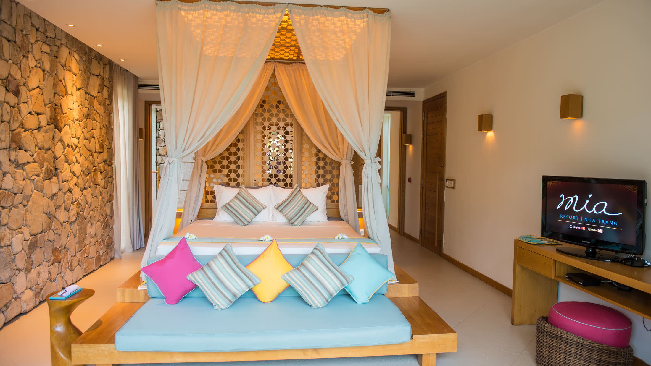 a living room filled with furniture and a fireplace