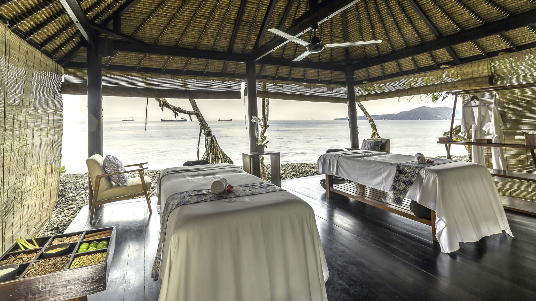 a chair sitting in front of a building