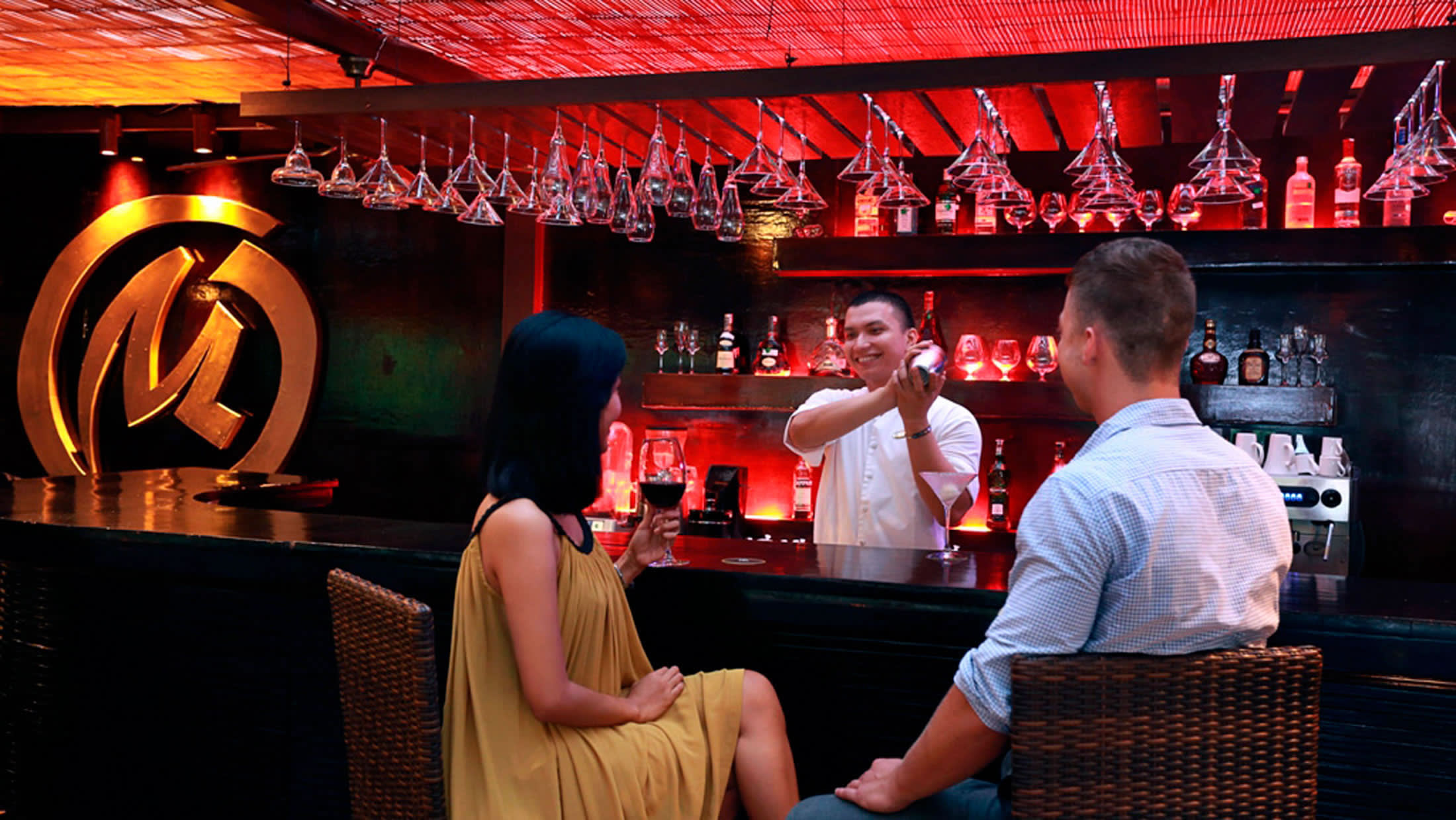 a group of people sitting at a table in front of a store
