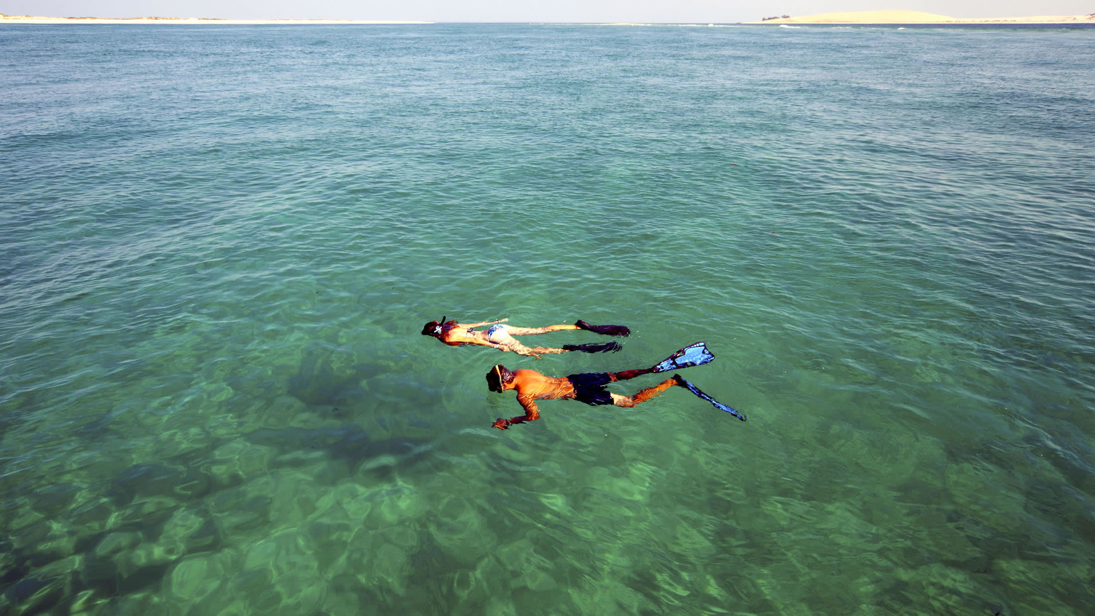 a small boat in a body of water