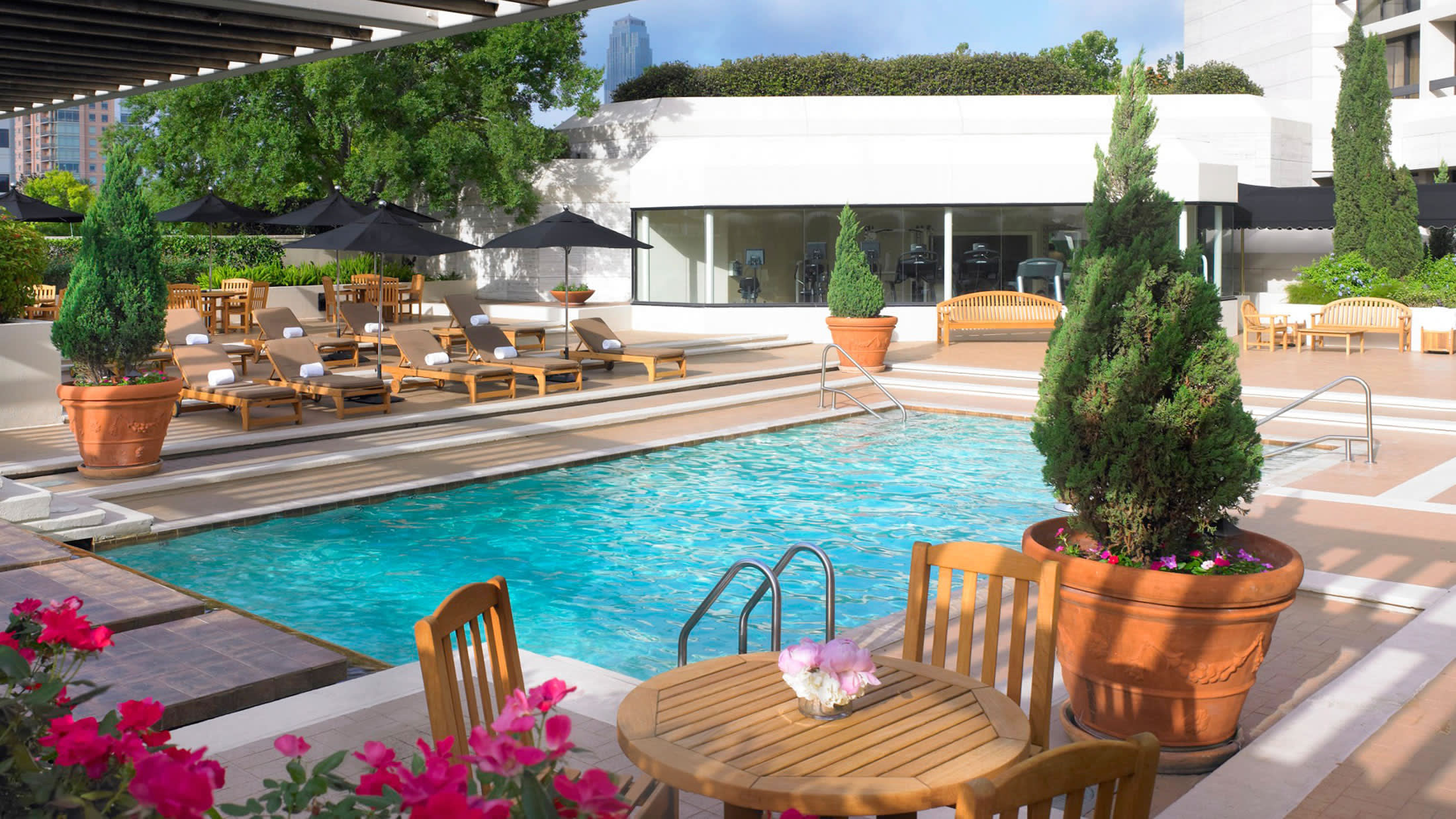 a house with a pool table in a garden