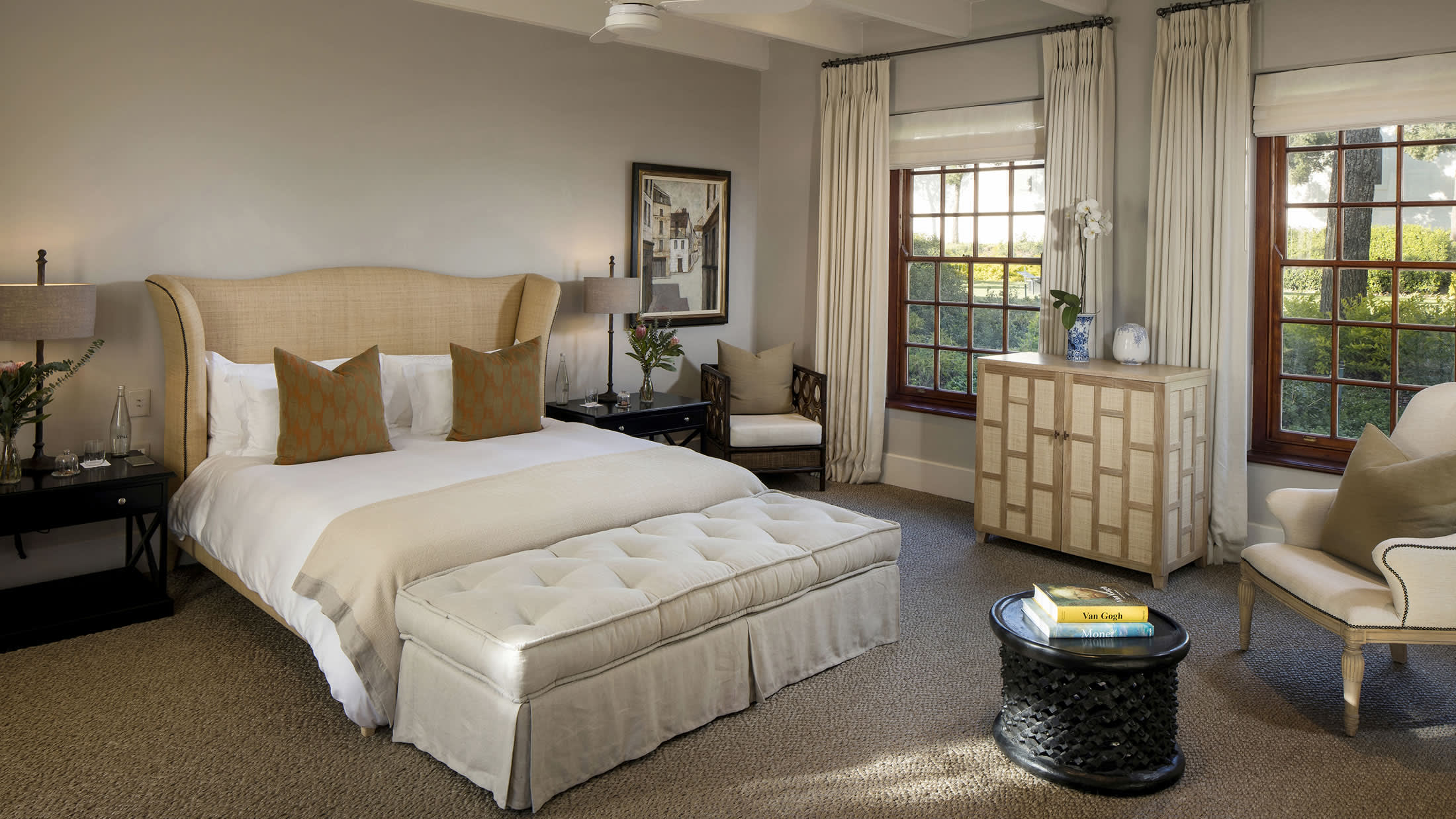 a bedroom with a large bed in a hotel room