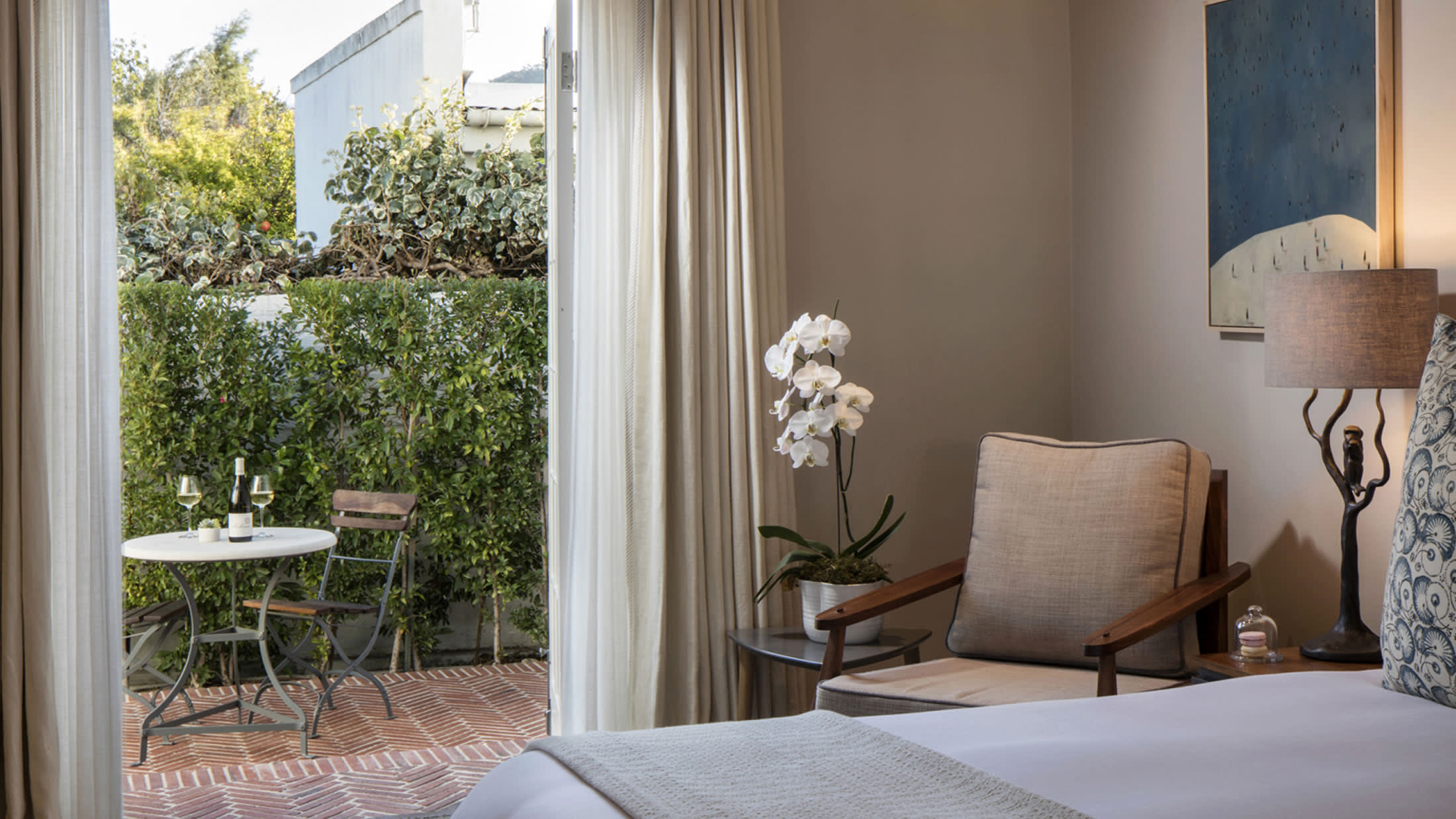 a bedroom with a large window