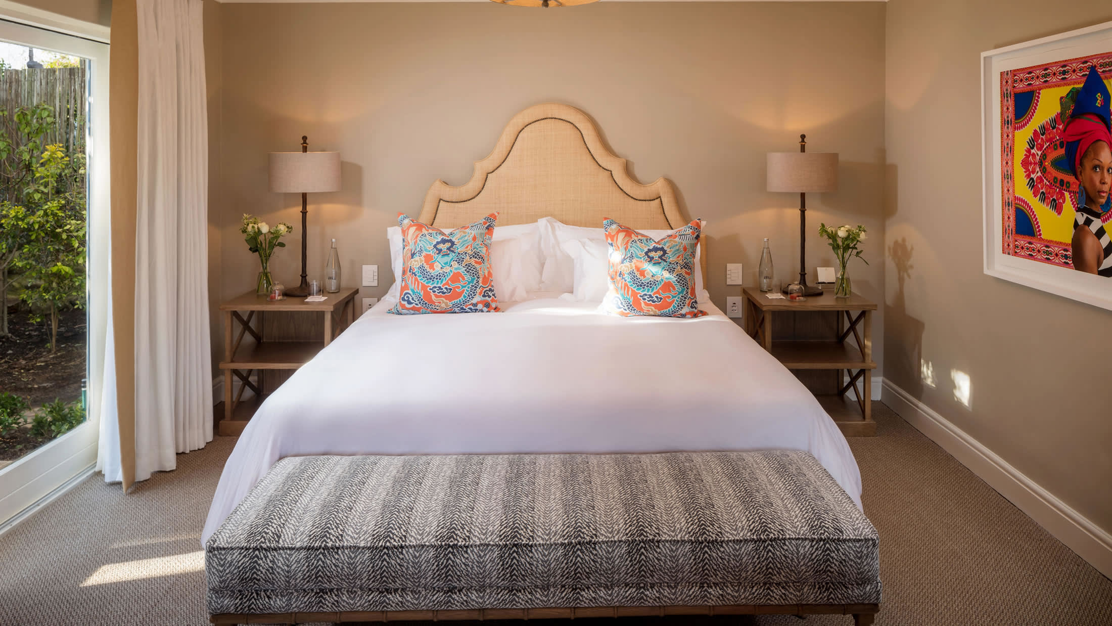 a bedroom with a large bed in a room