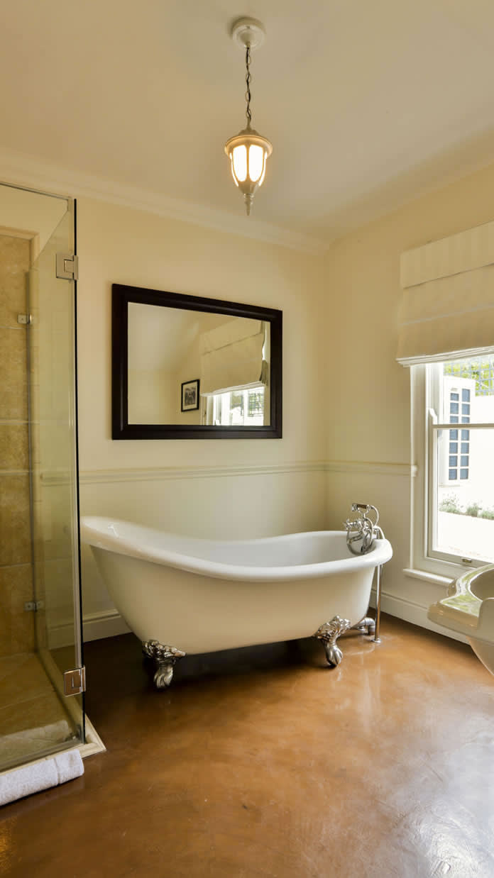 a room with a sink and a mirror