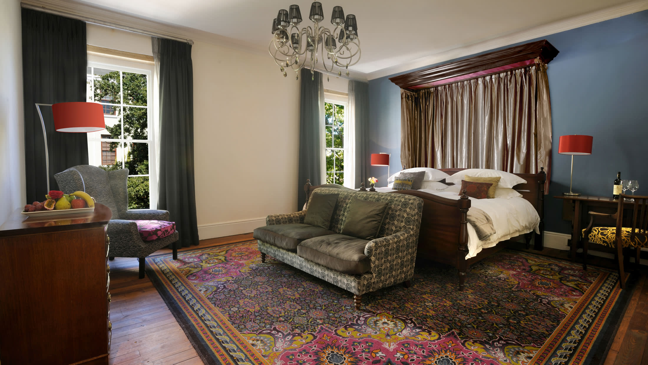 a living room filled with furniture and a large window