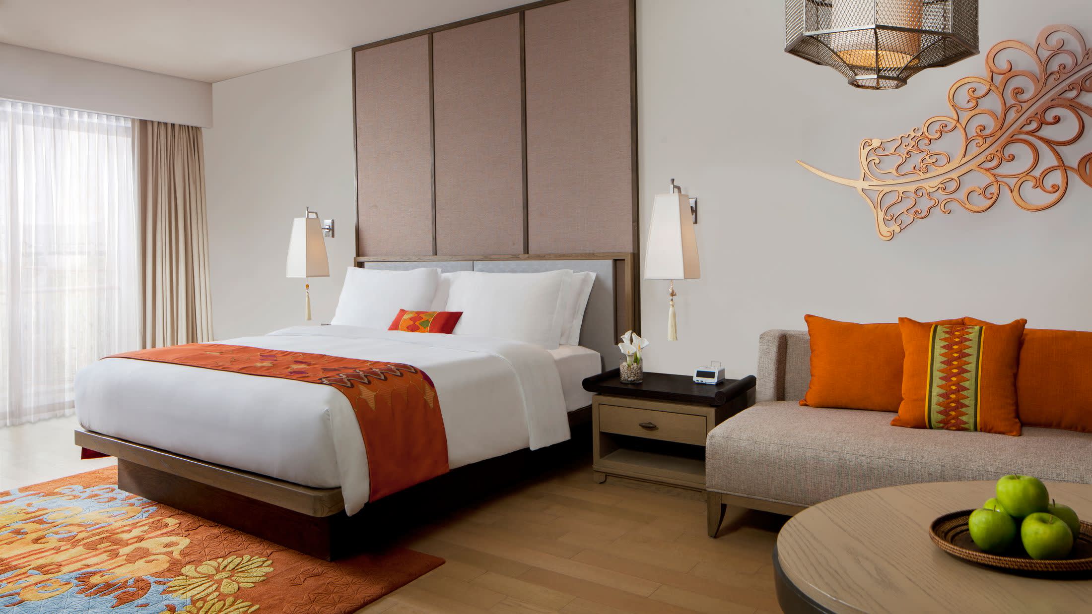 a bedroom with a bed in a hotel room