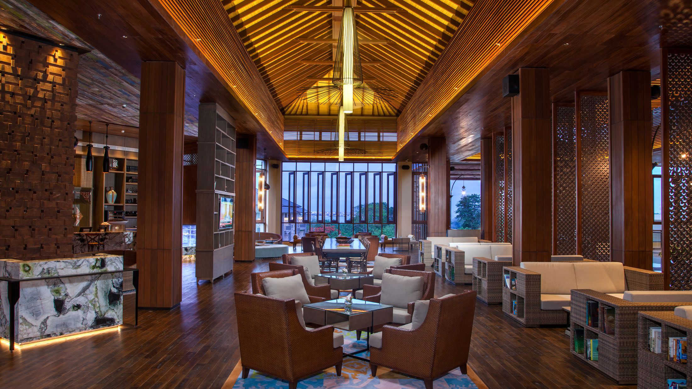 a room filled with furniture and a large window