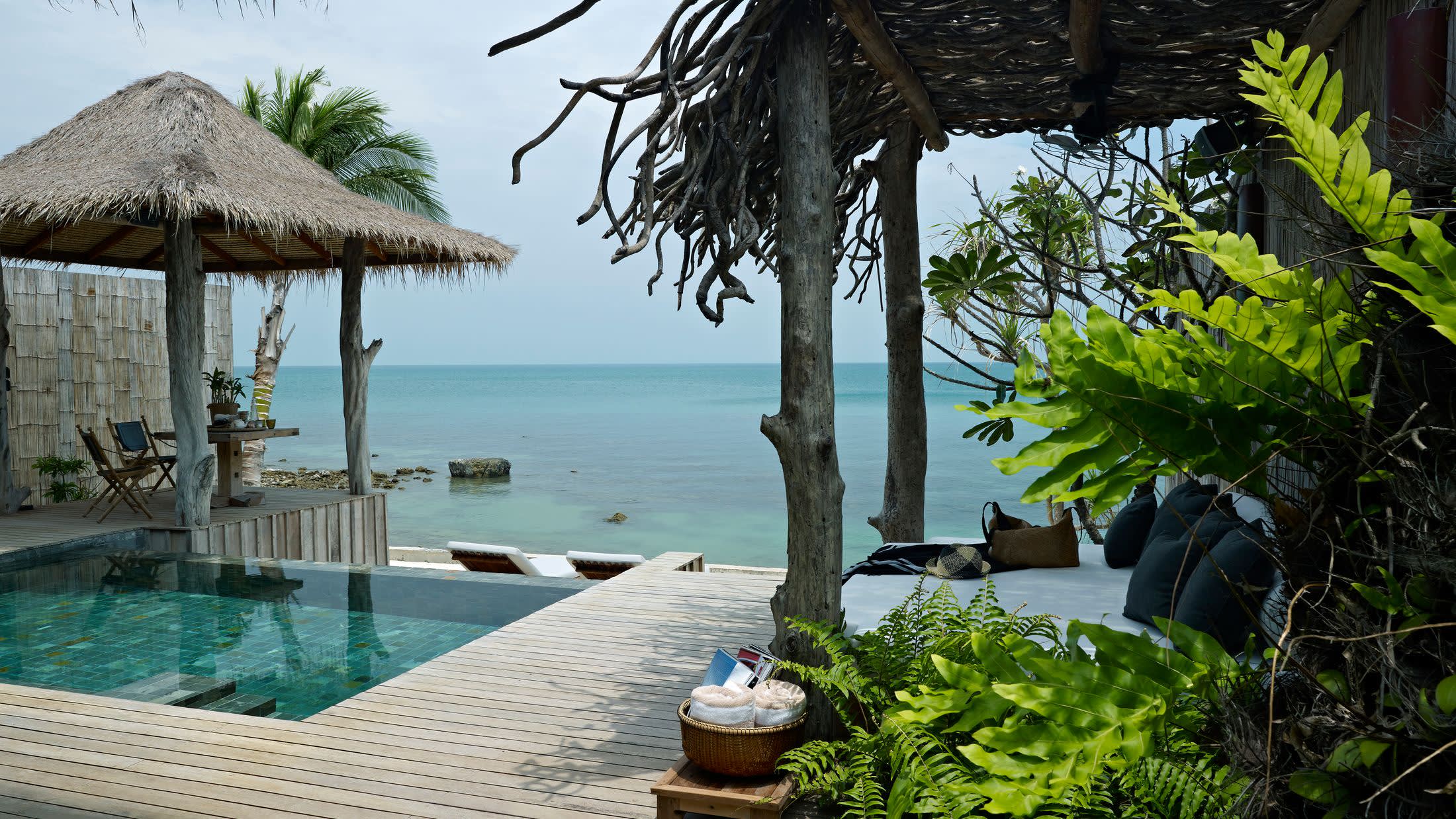 a pool next to a body of water