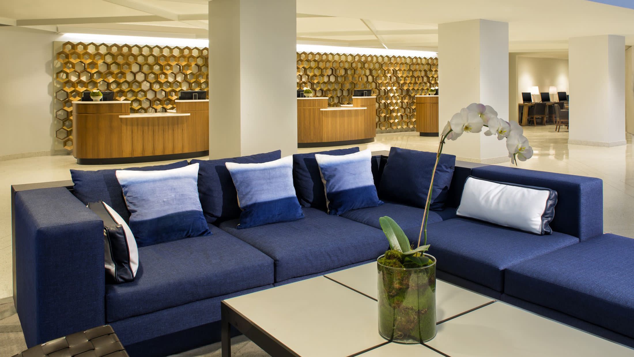 a living room with a couch and a table