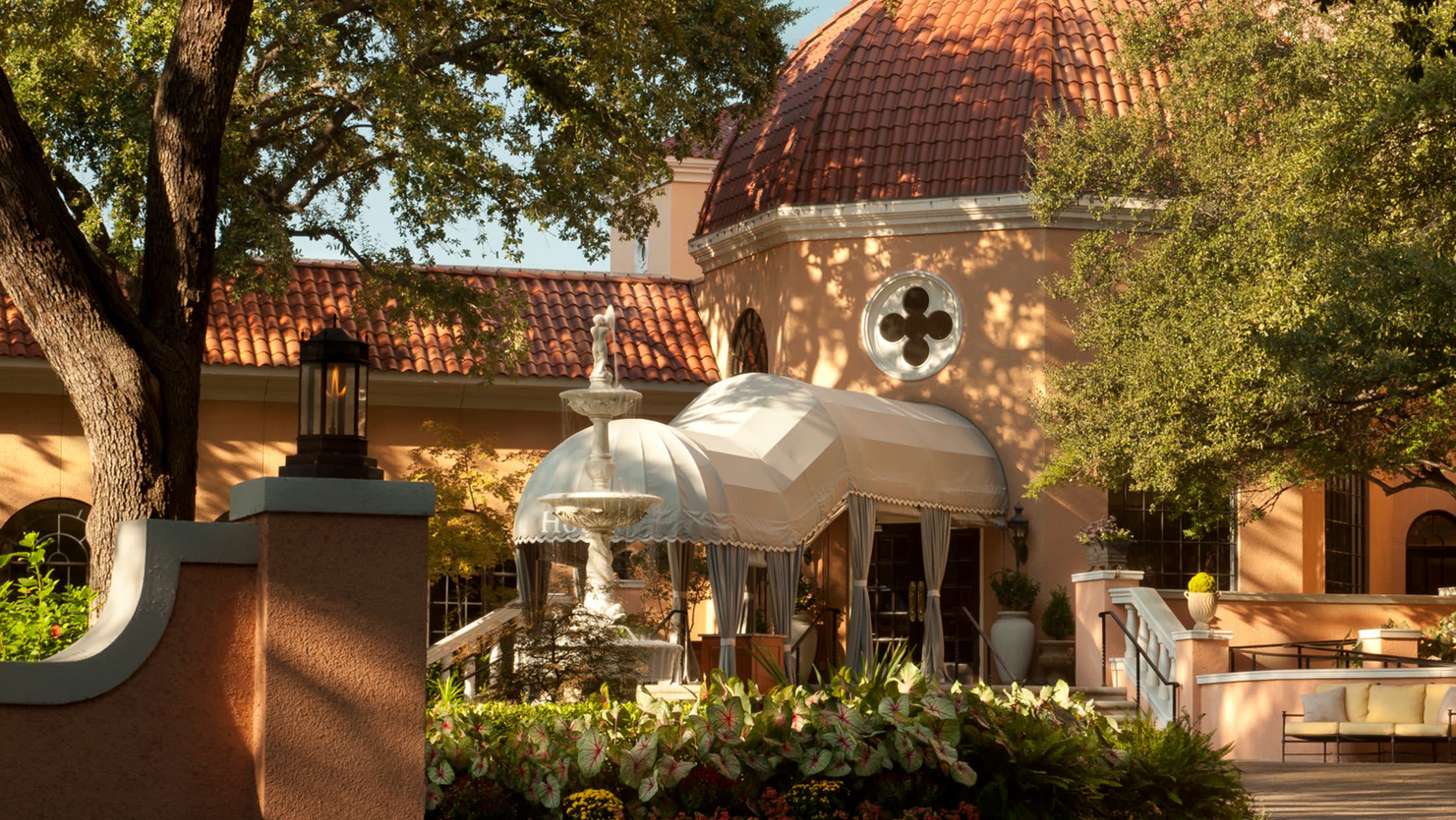 a christmas tree in front of a building
