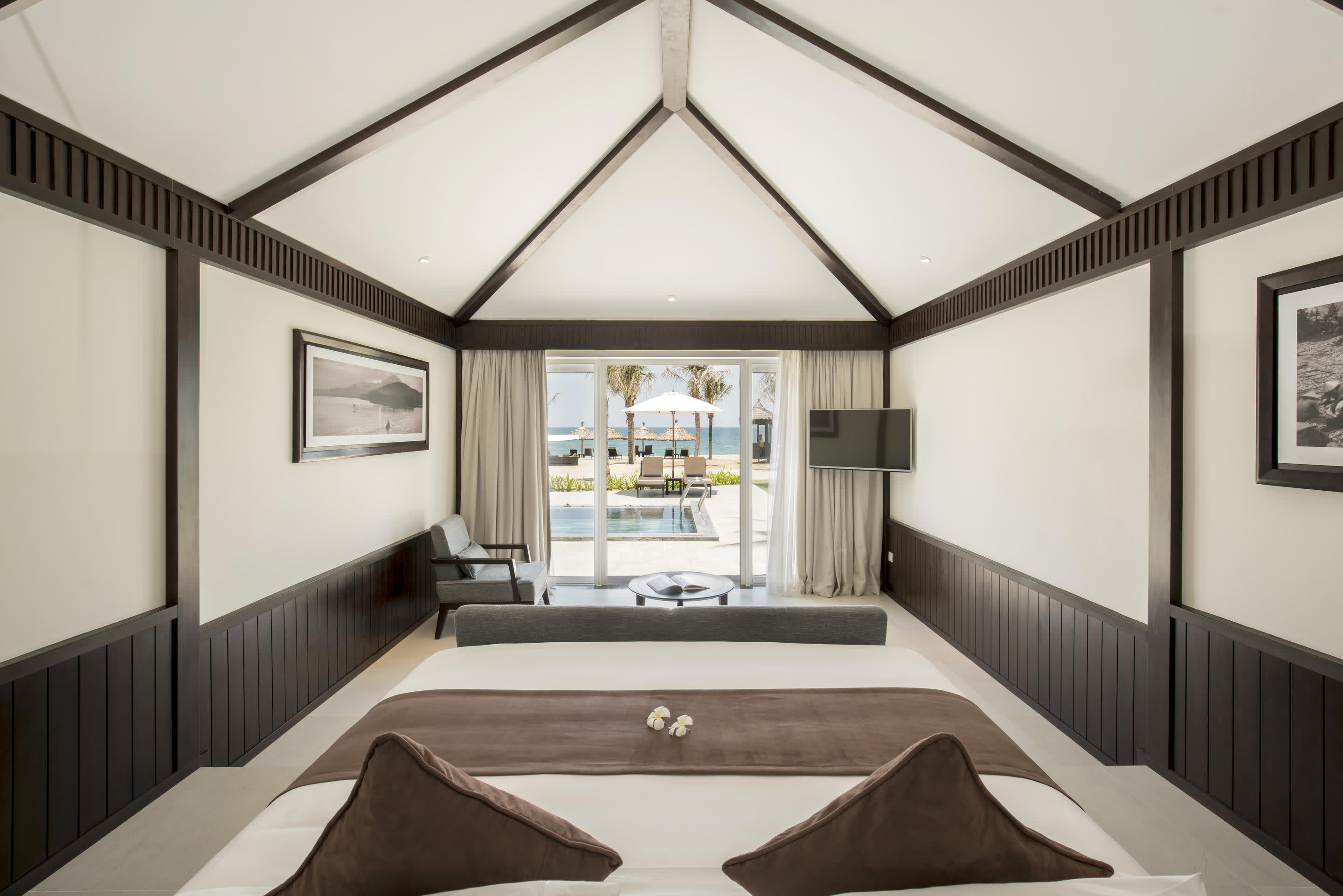 a bedroom with a bed in a room